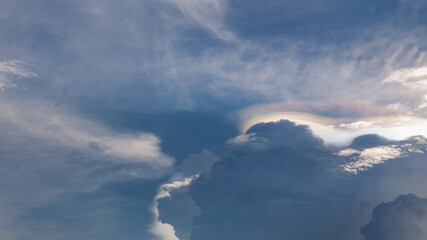 Naklejka na ściany i meble iridescent pileus cloud or rainbow cloud