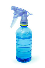 Blue plastic  foggy sprayer bottle isolated on white background. selective focus, soft focus.
