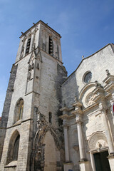Fototapeta na wymiar Looking up at Saint Saviour Church which is a Catholic church in the old town of La Rochelle, Charente Maritime, France.