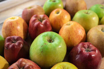 Tasty green, yellow and red apples. Healthy and nutritious food