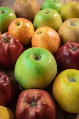 Tasty green, yellow and red apples. Healthy and nutritious food