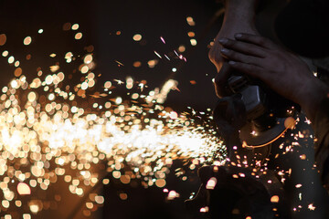 Sharpening metal, making of an axe, traditional smithy