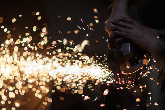 Sharpening metal, making of an axe, traditional smithy