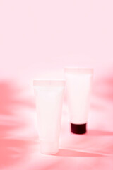 Cosmetics tube over background with shadow