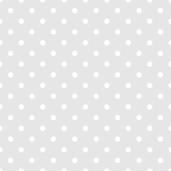 Seamless white and grey vector pattern or tile background with small polka dots