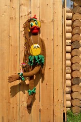 RUSSIA-TOPKI 2014: Monkey doll on wooden wall background. Home needlework-knitting, summer exhibition in Topki, Kemerovo region