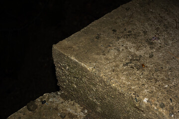Antique stone steps in the dark is close