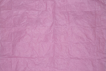 Fototapeta premium pink crumpled paper texture, vintage crease background