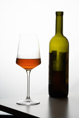 Nutmeg wine on a white background