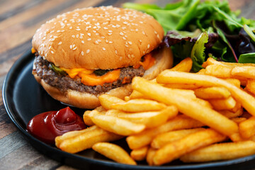 Cheese burger - American cheese burger with Golden French fries