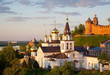 Fototapeta na wymiar Orthodox Church and the Kremlin in the evening sunset in Nizhny Novgorod