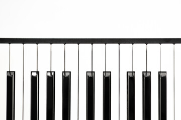  Piano keyboard on white background, top view layout, free space, white and black keys on the...