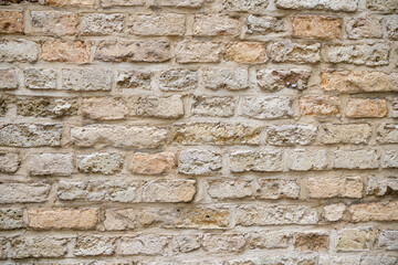 Beige old brick wall background grunge texture