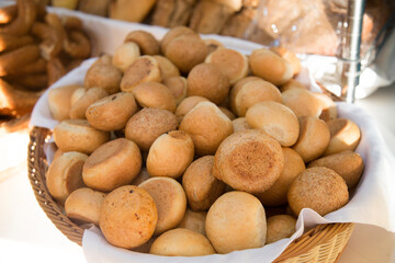 Bakery products many loaves of bread are on the counter.