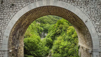 Lavelle bridge between Cerreto Sannita and Cusano Mutri in Benevento, Italy.  This place is famous in Italy due to the erosion of the rocks by the river. Perfect place for trekking and nature lovers.