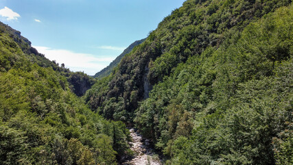 Fototapeta premium Lavelle bridge between Cerreto Sannita and Cusano Mutri in Benevento, Italy. This place is famous in Italy due to the erosion of the rocks by the river. Perfect place for trekking and nature lovers.
