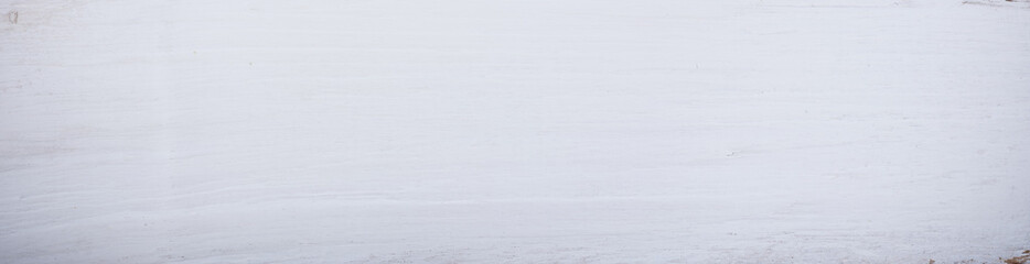 White painted wall texture. Panoramic yellow wall background. Empty with copy space for ad text