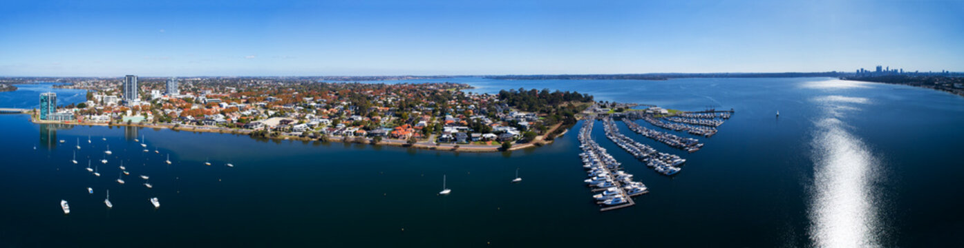 Panorama aerial view of Applecross with Canning Bridge, Yacht club and the mouth of the Canning River in the Swan River. On the horizon Perth CBD and South Perth. WA, Australia