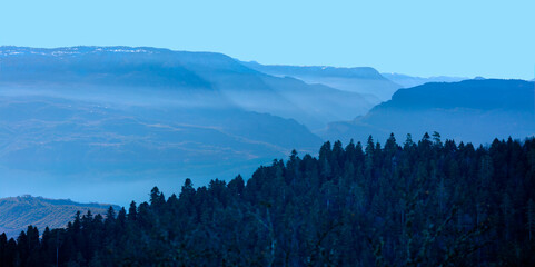 Amazing landscape with Cascade blue mountains at twilight blue hour  