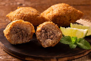 Potato Kibbeh - Middle Eastern minced meat and bulghur wheat fried snack made with potato. Also popular party dish in Brazil (kibe).