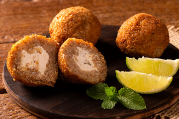 Potato Kibbeh - Middle Eastern minced dry curd wheat fried snack made with potato. Also popular party dish in Brazil (kibe)