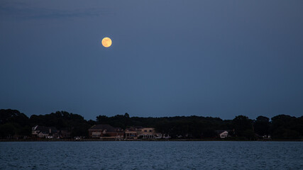 Orange Moon Over Water