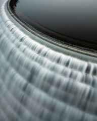 Fast flow of water cascading down a dam from a reservoir. New Croton Dam New York. 