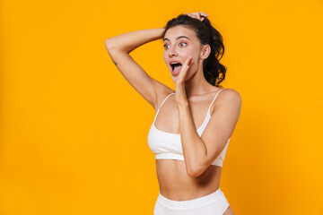 Obraz premium Image of beautiful excited woman looking and screaming aside