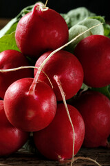 Fresh picked radishes on a wooden table.