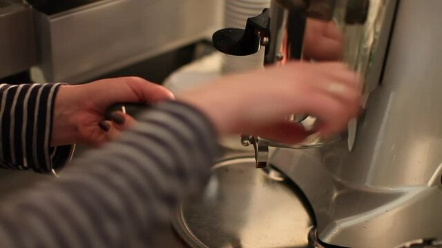Сoffee grinder. Coffee machine working