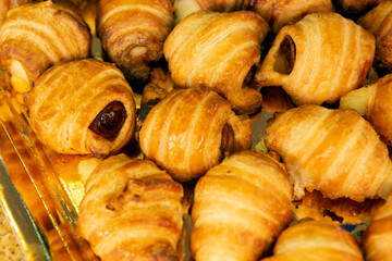 croissant on a black xocolate