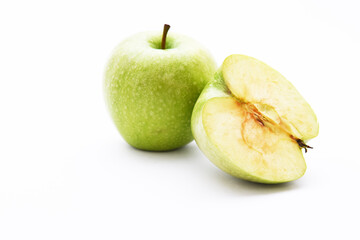 sliced green apple isolated on white
