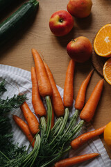 Fruits and vegetables on the wooden background