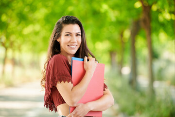 Fototapeta premium brunette girl ready to go back to school