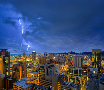 Thunder Storm Lightning  Sky Over Nigkt Cityscape Of Kobe Bay In Kobe City, Japan