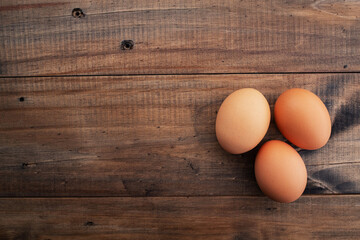 egg on wood background, fresh egg
