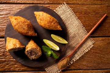 Potato Kibbeh - Middle Eastern minced meat and bulghur wheat fried snack made with potato. Also popular party dish in Brazil (kibe).