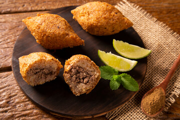 Potato Kibbeh - Middle Eastern minced meat and bulghur wheat fried snack made with potato. Also popular party dish in Brazil (kibe).