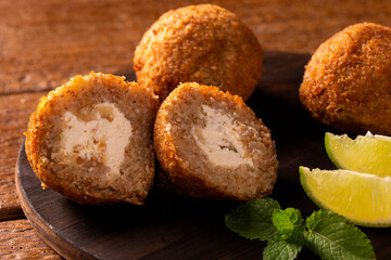 Potato Kibbeh - Middle Eastern minced dry curd wheat fried snack made with potato. Also popular party dish in Brazil (kibe)