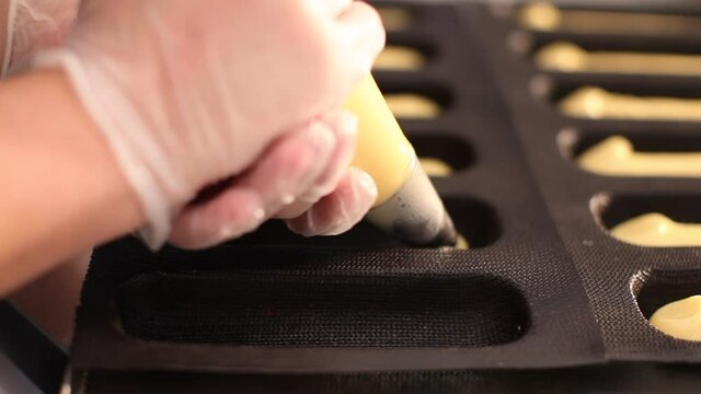 Molding the cookies. 
cookie making process