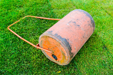 old heavy steel garden grass rolleron the fresh lawn