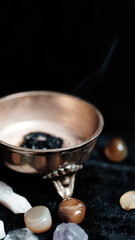Incense in a bowl on the background.