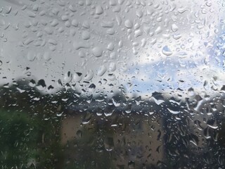 Raindrops on transparent glass background