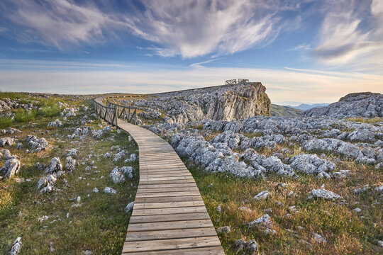 wooden footbridge over limestone rock landscape in Loja, Granada. Spain
