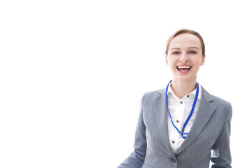 大笑いをするスーツを着たビジネスウーマン