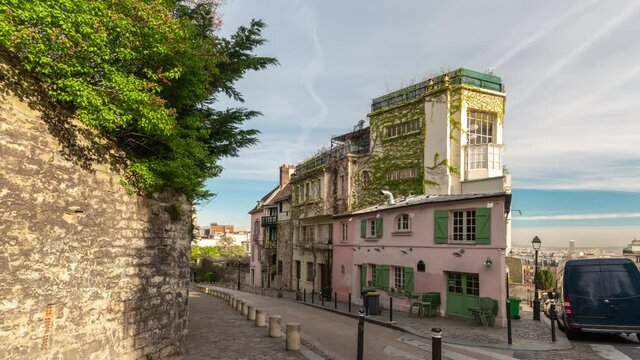Paris France time lapse 4K, city skyline timelapse at architecture building on Montmartre atreet