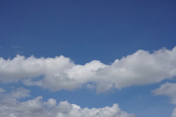 Blue sky with cloud background.