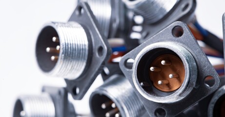 Close-up blurry metal sockets for plugs