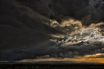 Fototapeta na wymiar Storm clouds over Laramie Valley in the evening; Wyoming