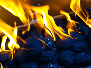 Barbecue grill close up with burning charcoal.
